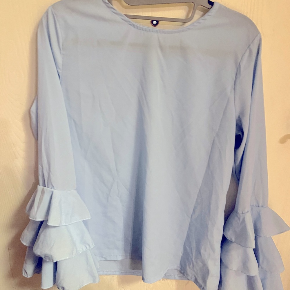 Ladies Blouse with triple bell long sleeves, size large.